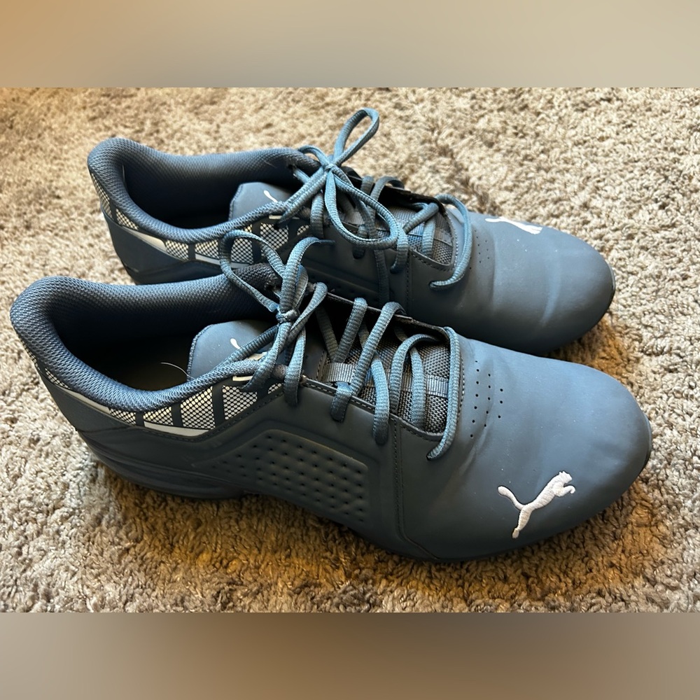 Blue puma running shoes